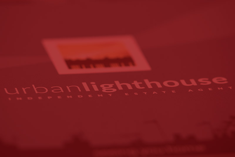background image of an Urban Lighthouse brochure cover